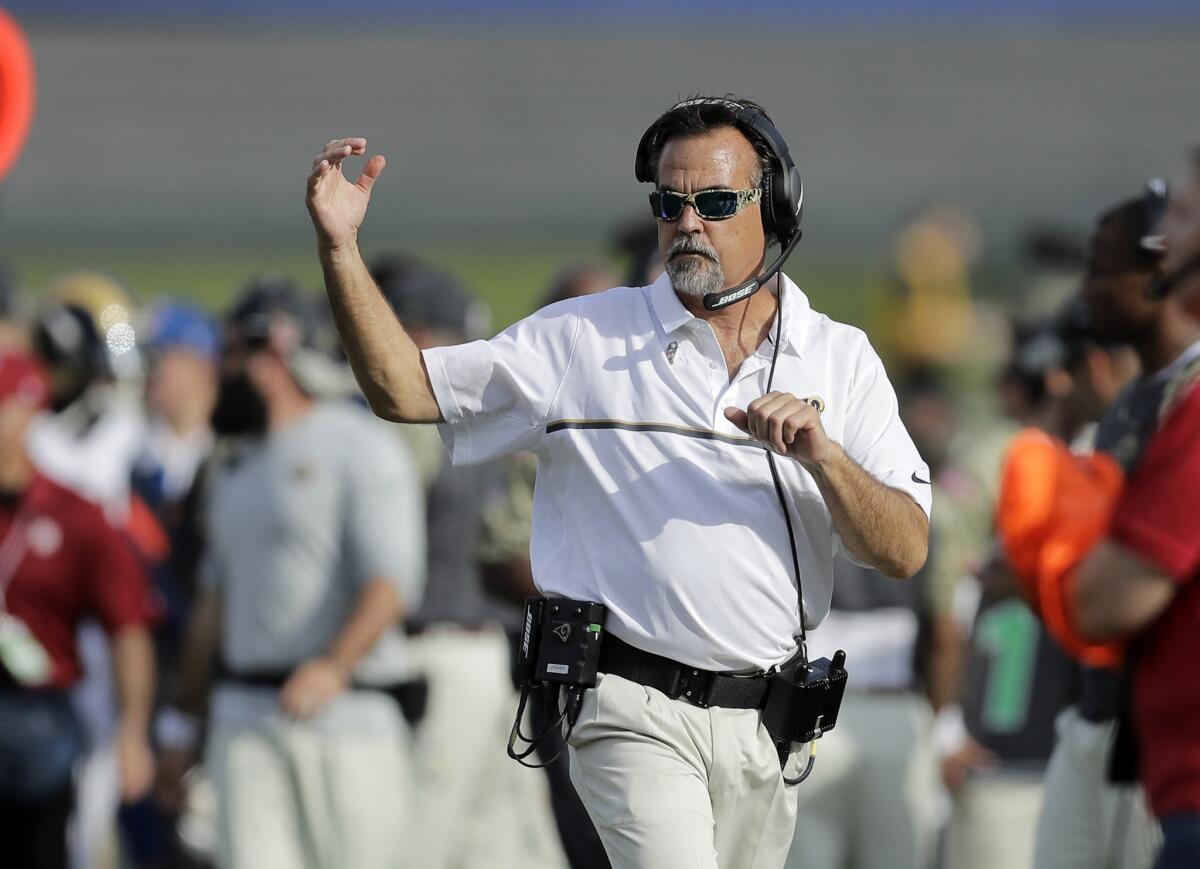 Rams Coach Jeff Fisher during the first half of a game against the Carolina Panthers on Sunday at the Coliseum.