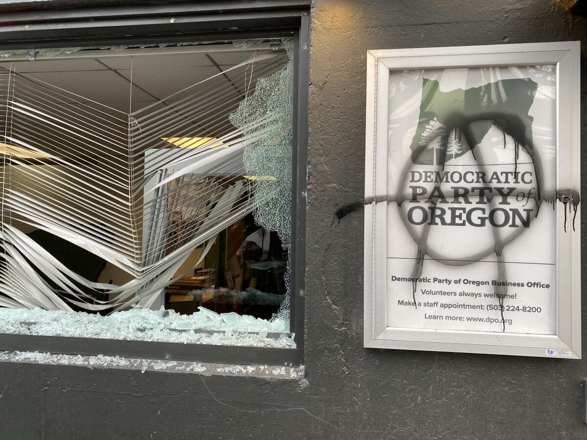 An anarchist symbol marks the Democratic Party of Oregon headquarters in Portland Wednesday.