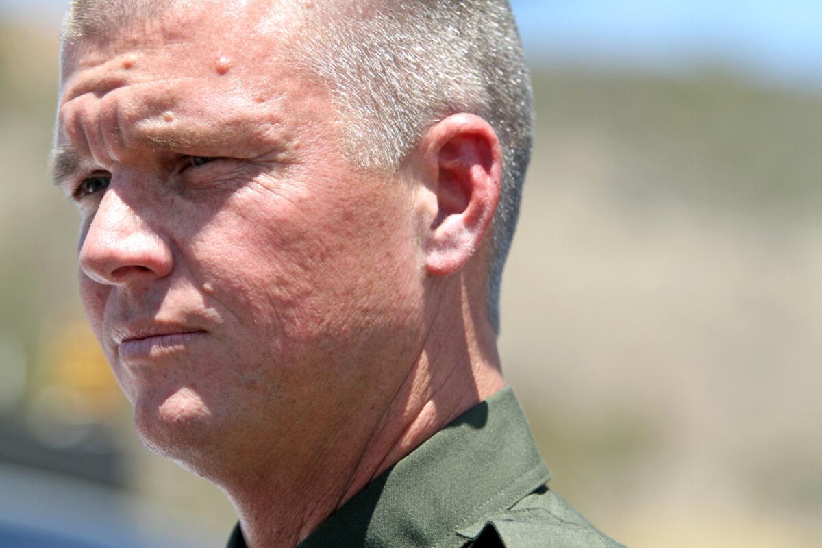 Orange County sheriff's Lt. Jeff Hallock speaks to reporters in Silverado on July 24, 2013.