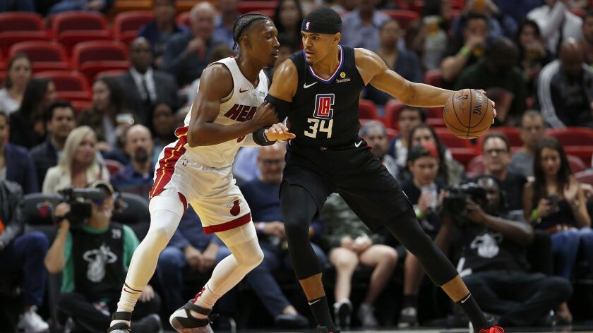 Clippers' Tobias Harris drives against the Miami Heat's Josh Richardson in the first quarter at American Airlines Arena in Miami.