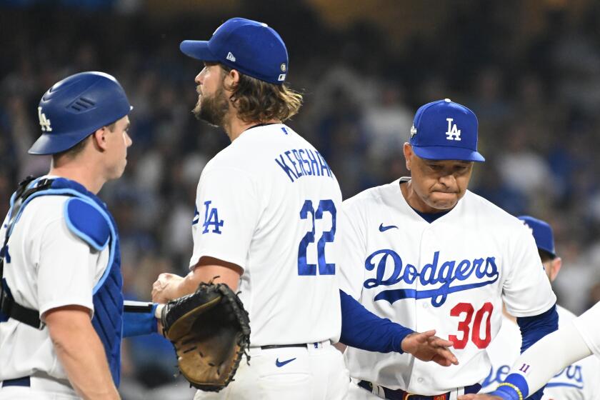 Los Angeles, CA - October 07: Clayton Kershaw is removed from the game after allowing 6 runs.