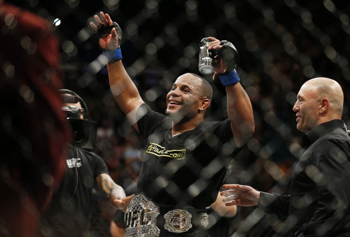 Daniel Cormier celebrates after his UFC 187 victory over Anthony Johnson on May 23, 2015.