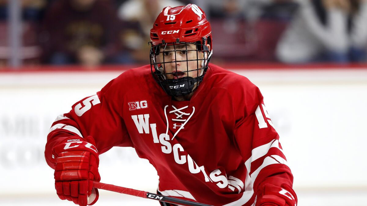 Alex Turcotte plays during a game for Wisconsin.