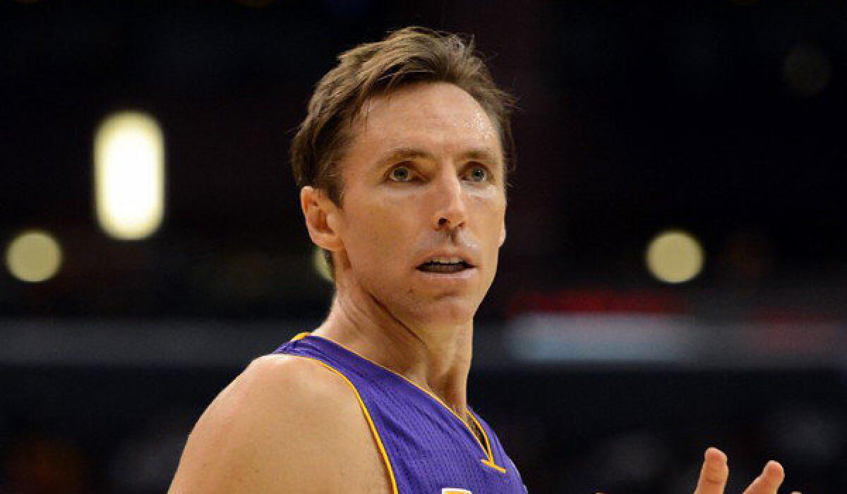 Lakers guard Steve Nash looks for a pass during a 97-91 loss to the Clippers in the preseason on Oct. 24.