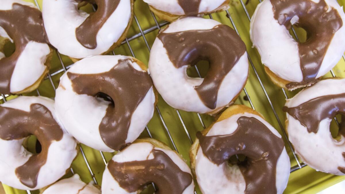 The black and white doughnut at Blinkie's Donuts. (Calvin B. Alagot / Los Angeles Times)