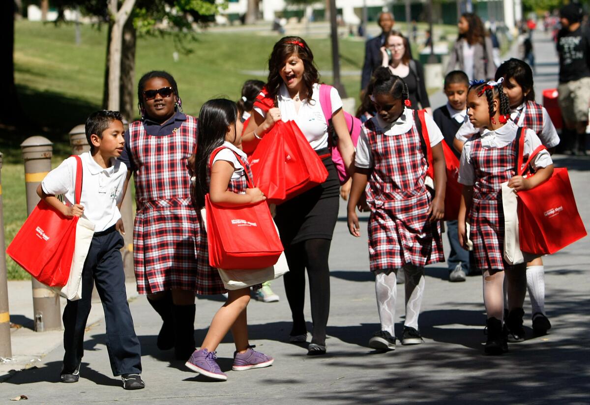 A teacher walks with her students from Wisdom Academy on a field trip to Cal State Northridge in 2013.