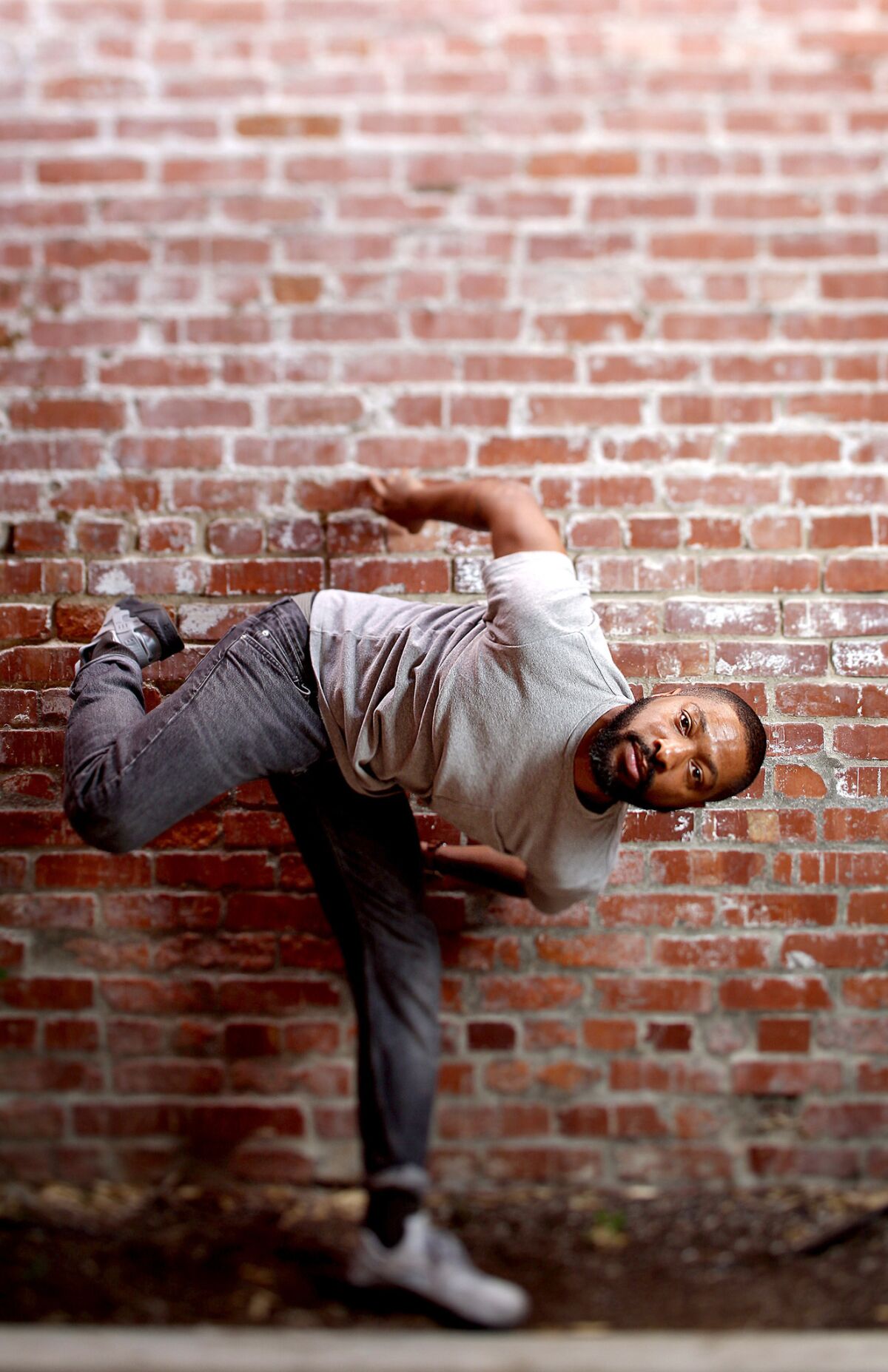 Choreographer Kyle Abraham found a brick wall in Eagle Rock to strike his pose.