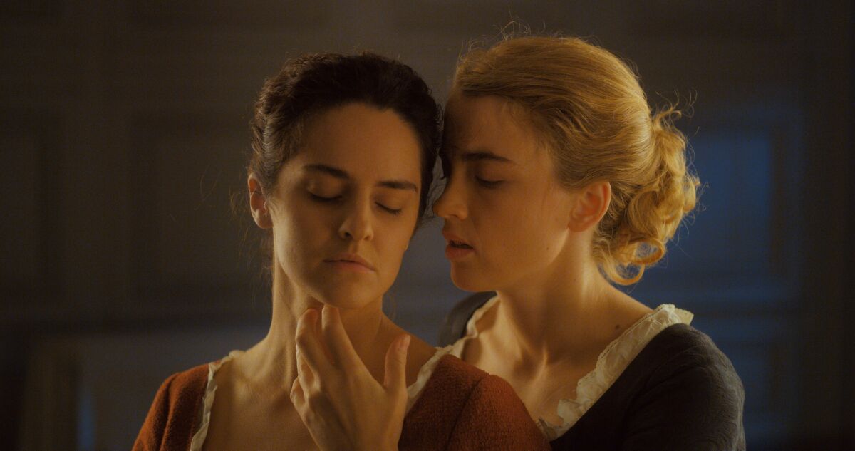 Noémie Merlant, left, and Adèle Haenel in the movie "The Portrait of a Lady on Fire."