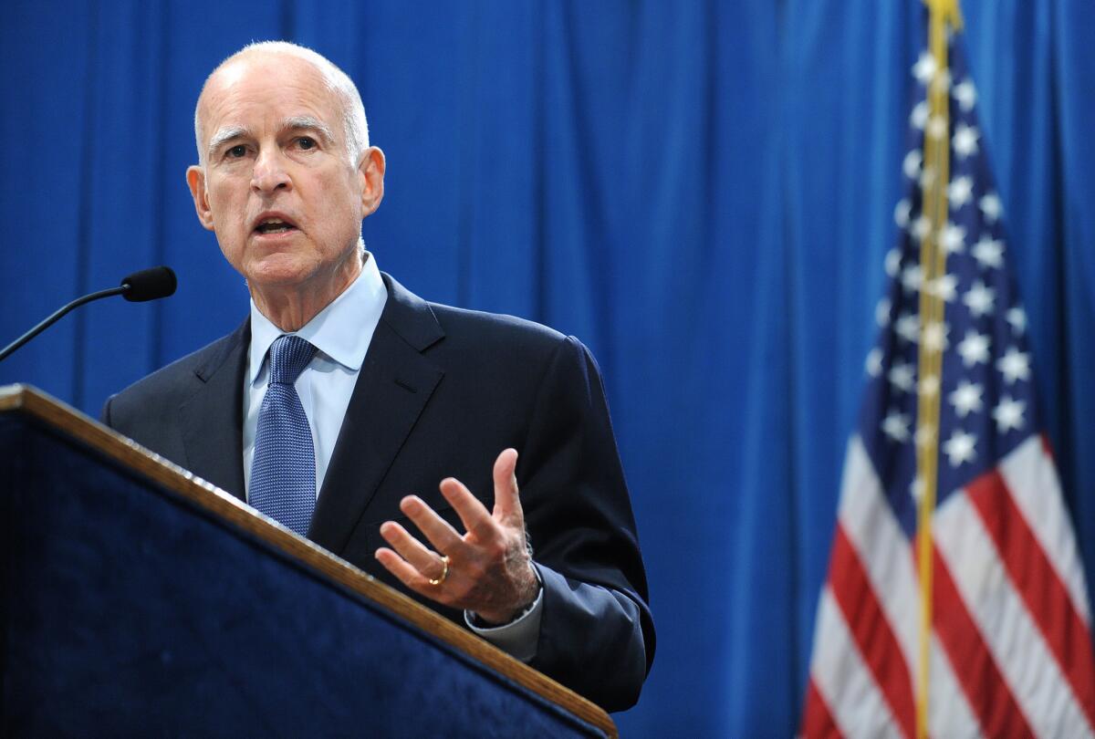Gov. Jerry Brown speaks to reporters the day after the November 2012 election, when voters approved his tax-hike plan.