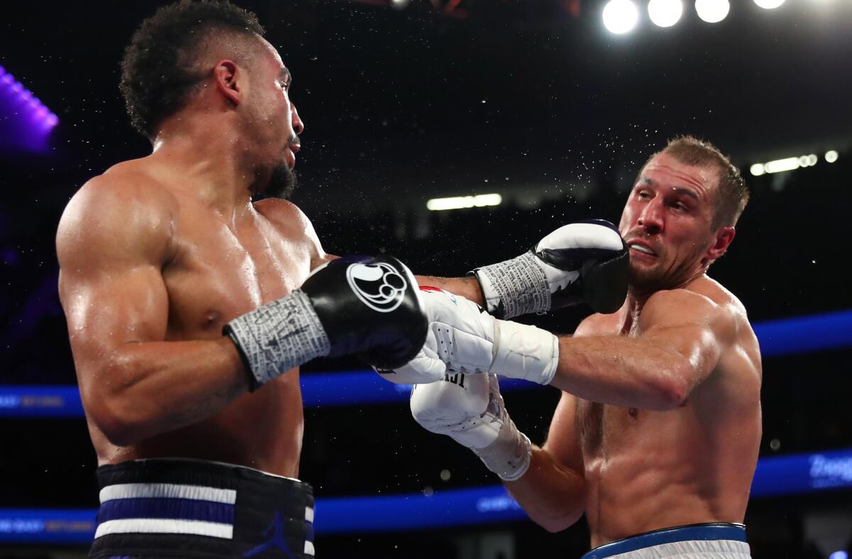 Andre Ward lands a left jab against Sergey Kovalev during their light-heavyweight title fight.