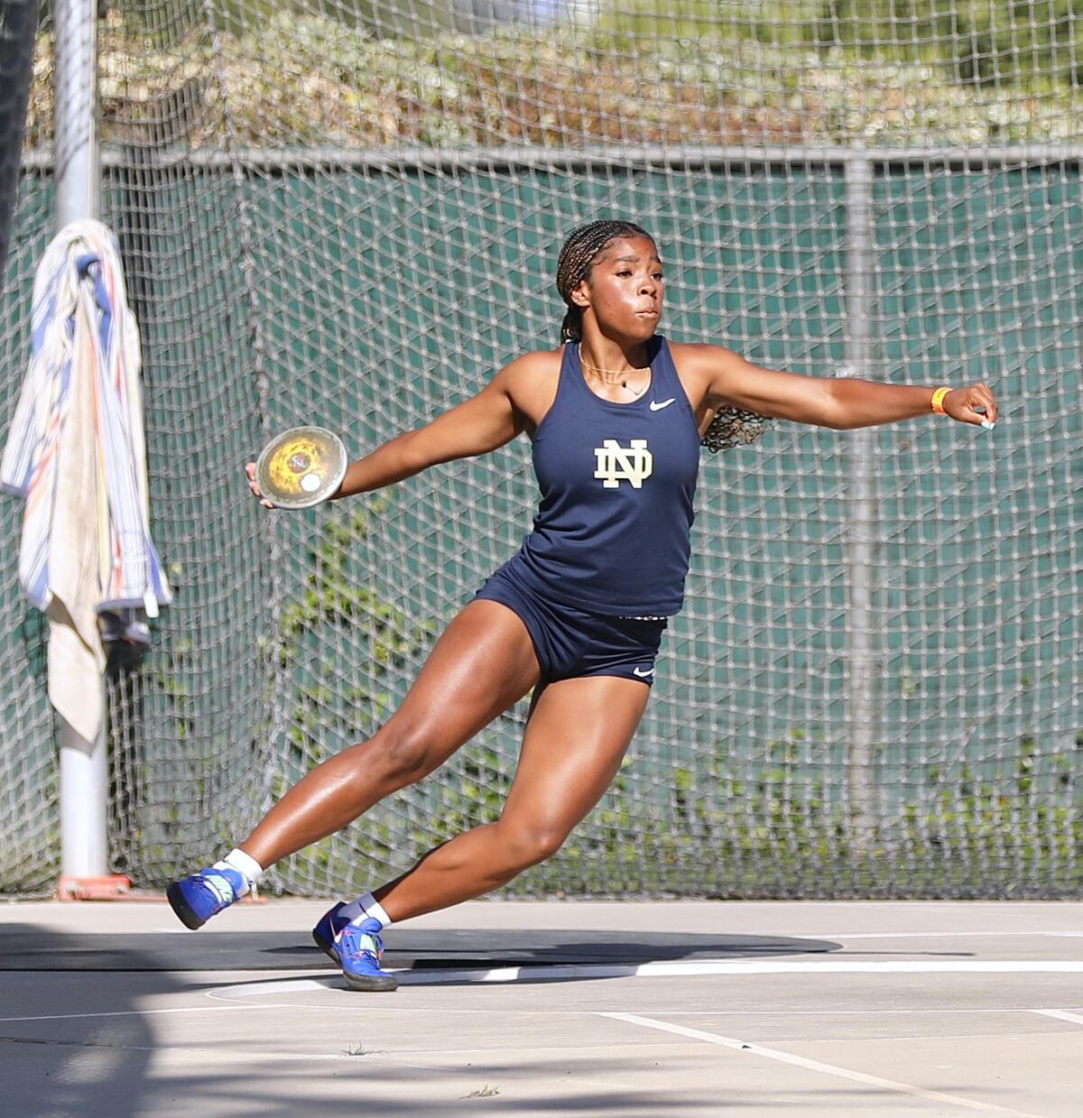 Sherman Oaks Notre Dame's Aja Johnson competes in girls' discus at the CIF state track and field championships.