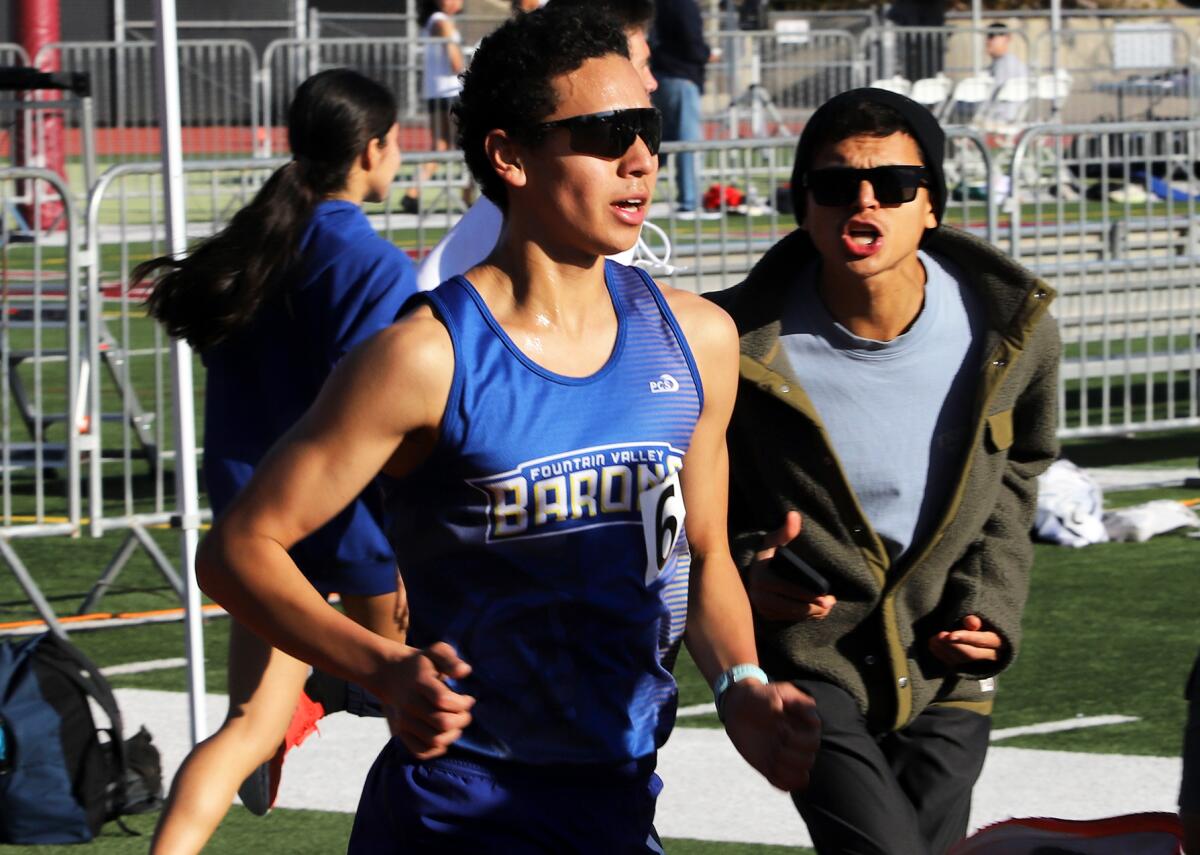 Fountain Valley's Benjamin Prado competes in the boys' 3,200-meter race in the Laguna Beach Trophy Invitational on Saturday.