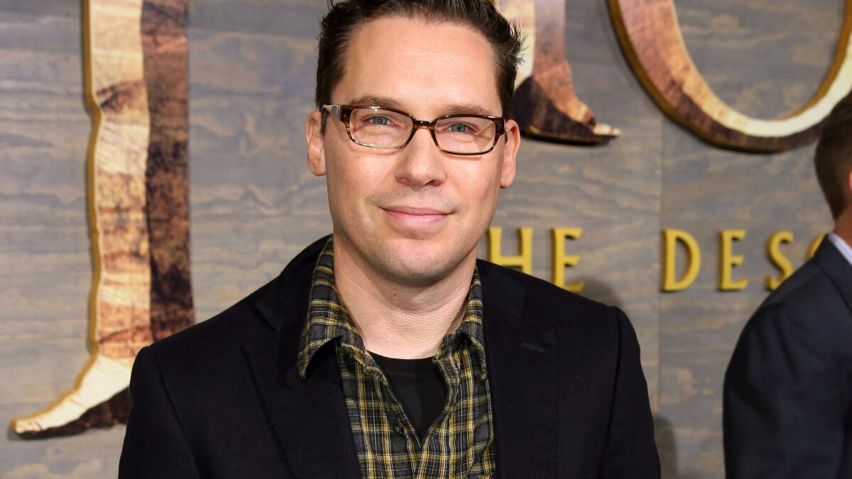 Director Bryan Singer, who has left the Queen biopic "Bohemian Rhapsody" in the middle of production, faces a lawsuit over alleged sexual assault of a teen in 2003.