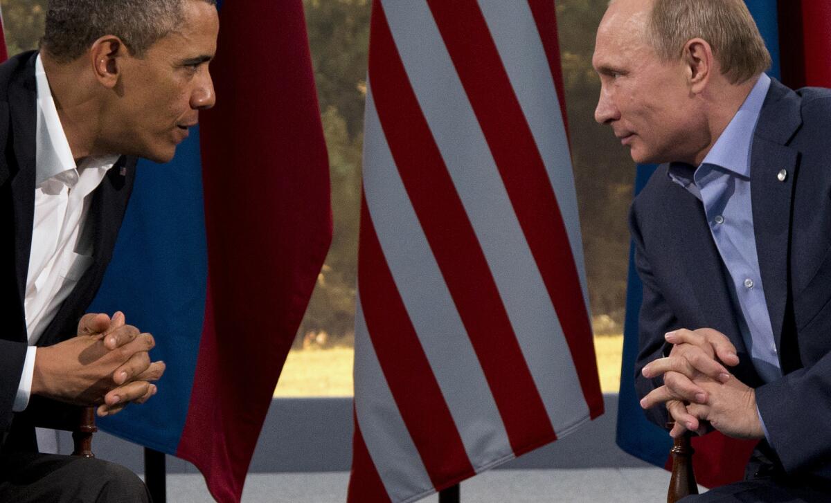 President Barack Obama is seen meeting with Russian President Vladimir Putin in Northern Ireland in June. It was reported Wednesday that Obama is canceling plans to meet with Putin in Moscow next month -- a rare diplomatic snub.