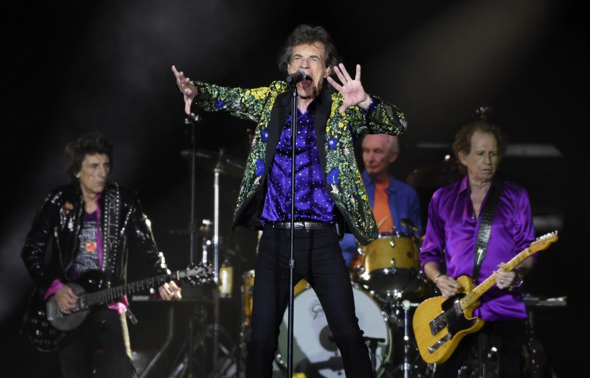 Mick Jagger, en el centro, y sus compañeros de los Rolling Stones Ron Wood, Charlie Watts y Keith Richards