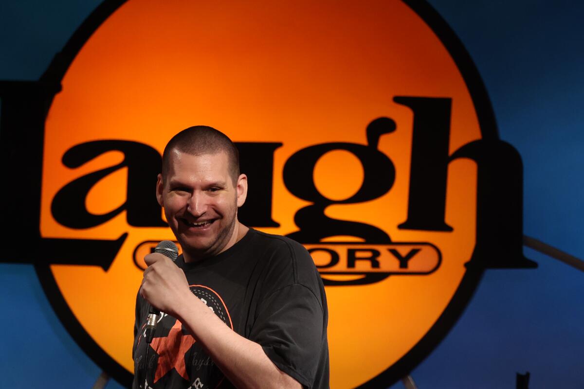 Comedian Joshua Meyrowitz performs during a comedy show at the Laugh Factory.