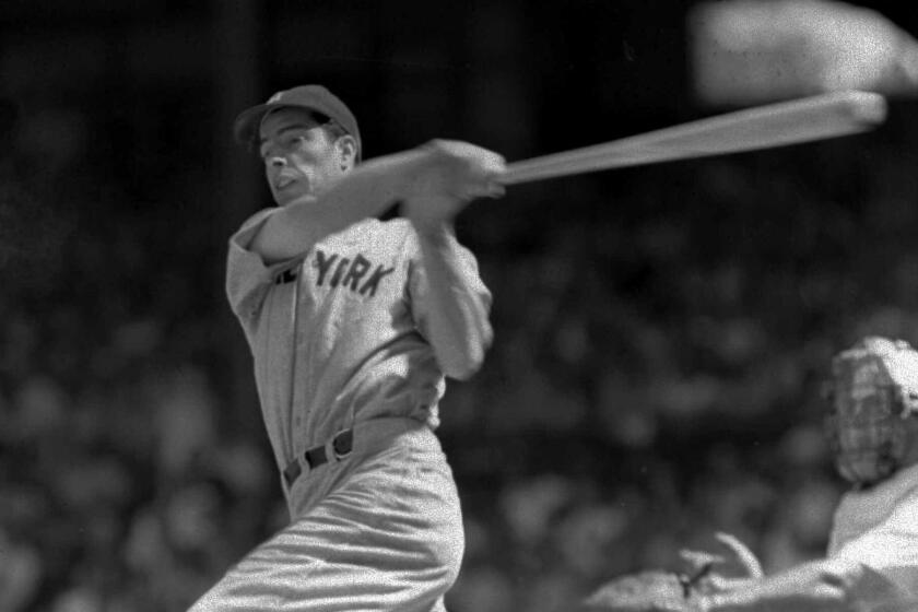 ADVANCE FOR WEEKEND of SEPT. 4–5––Joe DiMaggio lines a single to left field in the seventh inning.