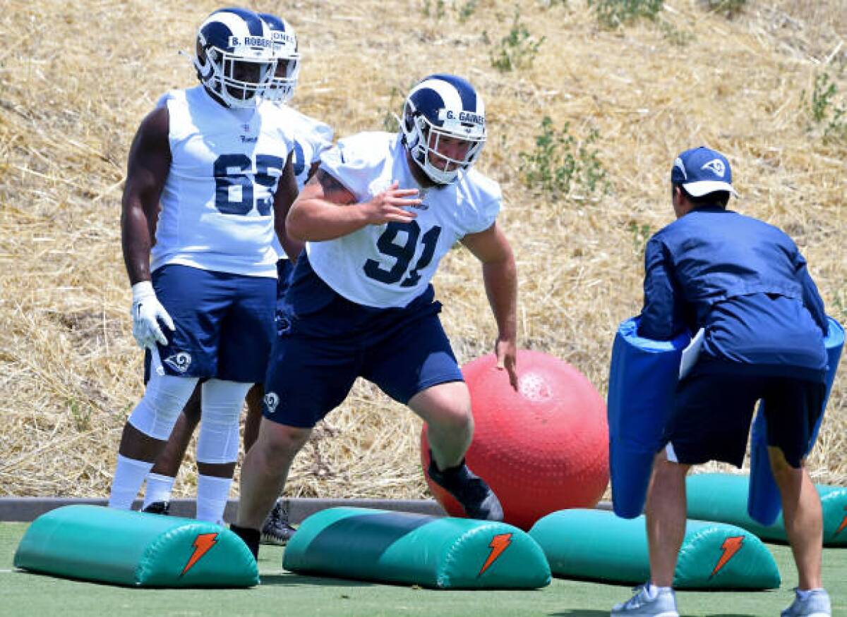 Rams defensive tackle Greg Gaines runs drills during minicamp at the team's practice facility at Cal Lutheran on June 11, 2019, in Thousand Oaks.
