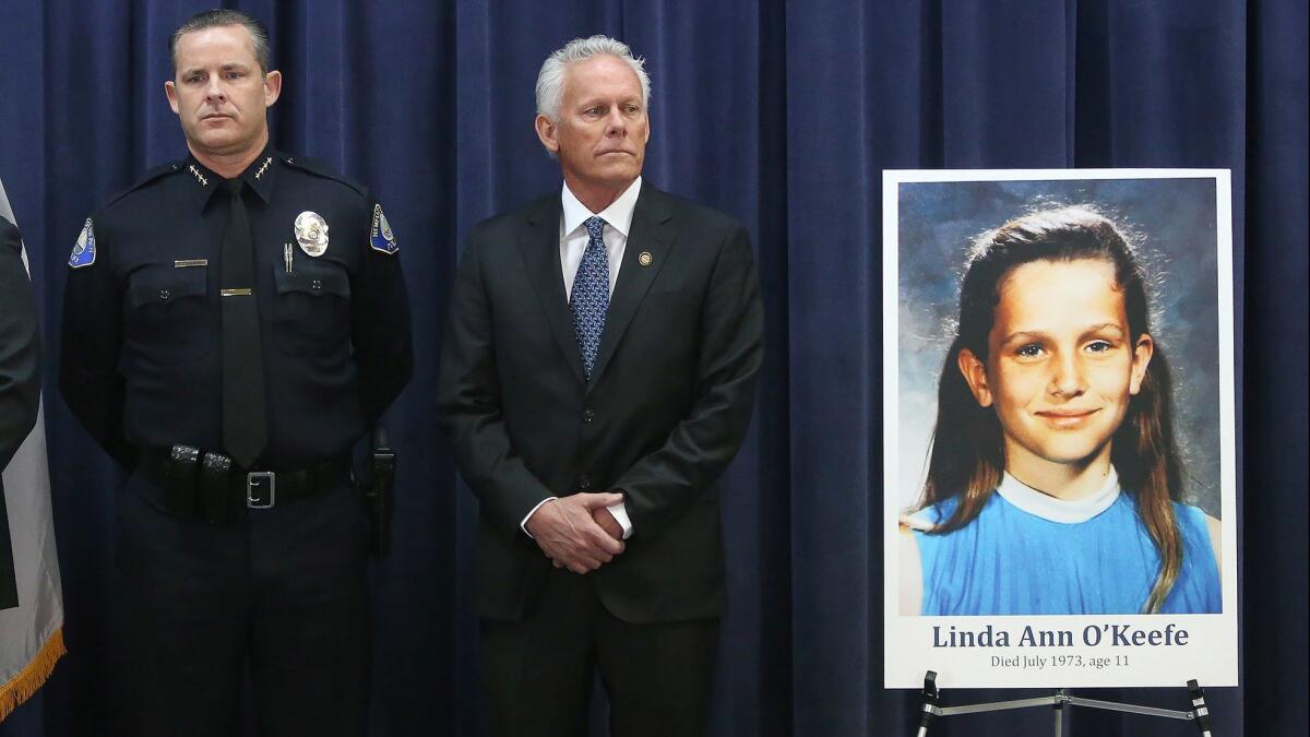 Newport Beach Police Chief Jon Lewis, left, and Councilman Brad Avery attend a news conference announcing the arrest of a man in the 1973 killing of Linda Ann O'Keefe.