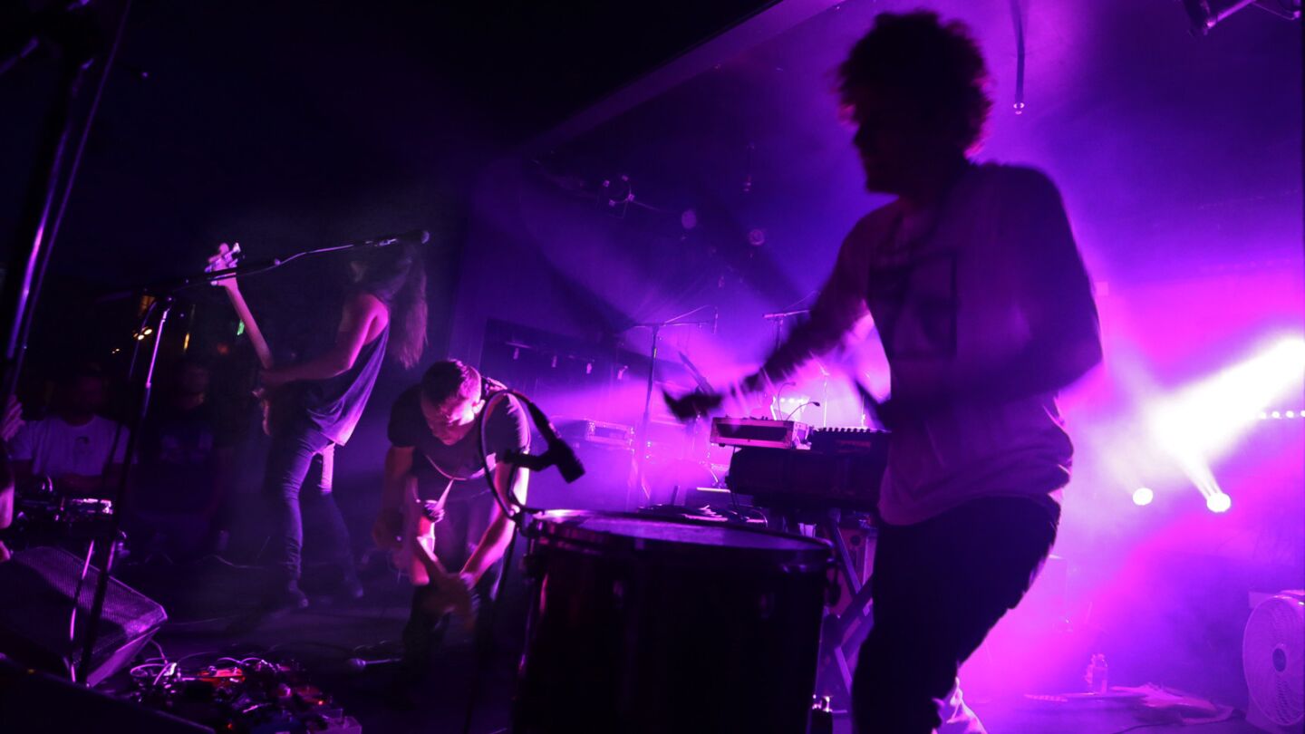 John Famiglietti, left, front man Jake Duzsik, and Jupiter Keyes of the L.A. experimental band Health performing at the Echo in Los Angeles on July 22, 2015.
