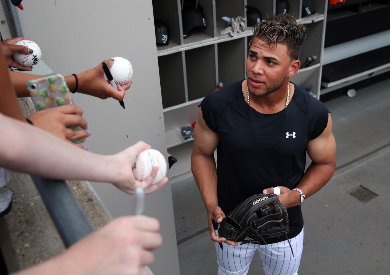 Yoan Moncada signs autographs before the start of the game against the Cubs at Guaranteed Rate Field on Wednesday, July 26, 2017.