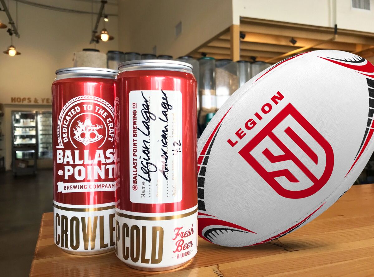 Cans of Legion Lager, a special release beer from Legion Rugby and Ballast Point Brewing.
