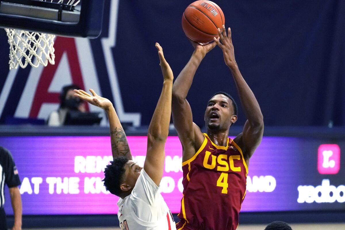 USC forward Evan Mobley shoots over Arizona forward Ira Lee during a Pac-12 game in January.