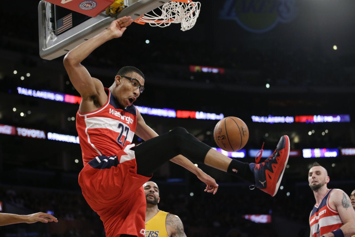 Wizards forward Otto Porter Jr. dunks during the Wizards' second-half comeback against the Lakers. The Wizards won 98-92 after being down 19 points in the first half.