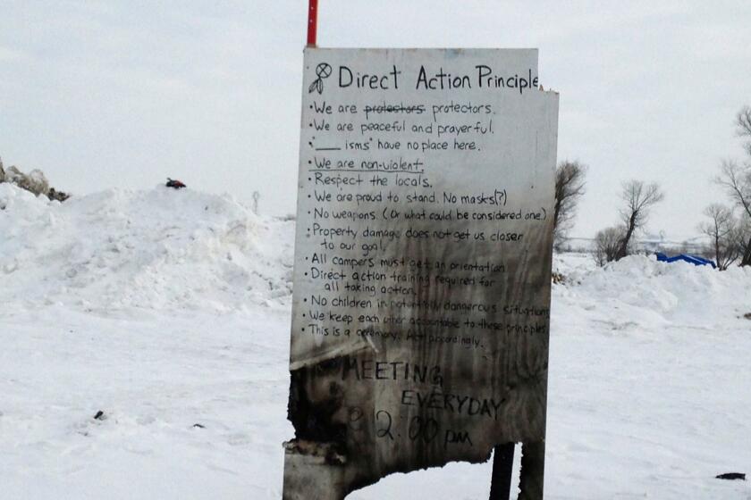 A sign Wednesday at an encampment near Cannon Ball, N.D., of opponents of the Dakota Access pipeline.