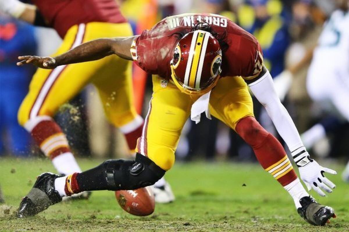 Robert Griffin III injured his knee on this play.
