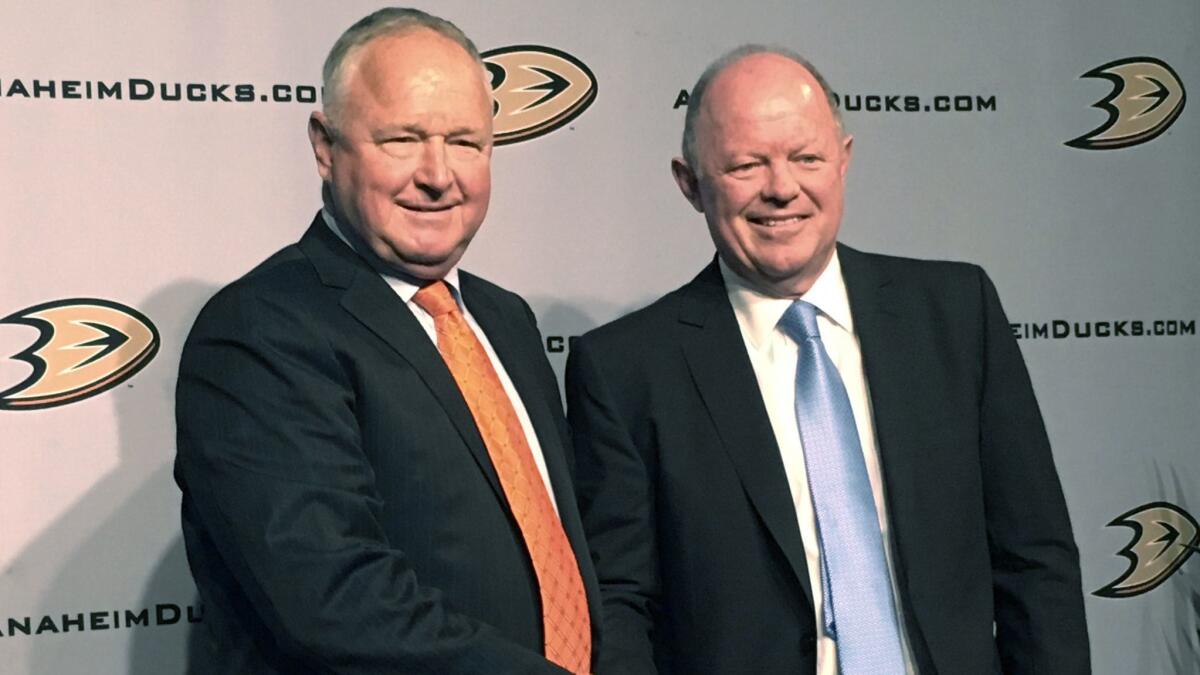 Former Ducks coach Randy Carlyle, left, and Ducks general manager and interim coach Bob Murray in 2016.