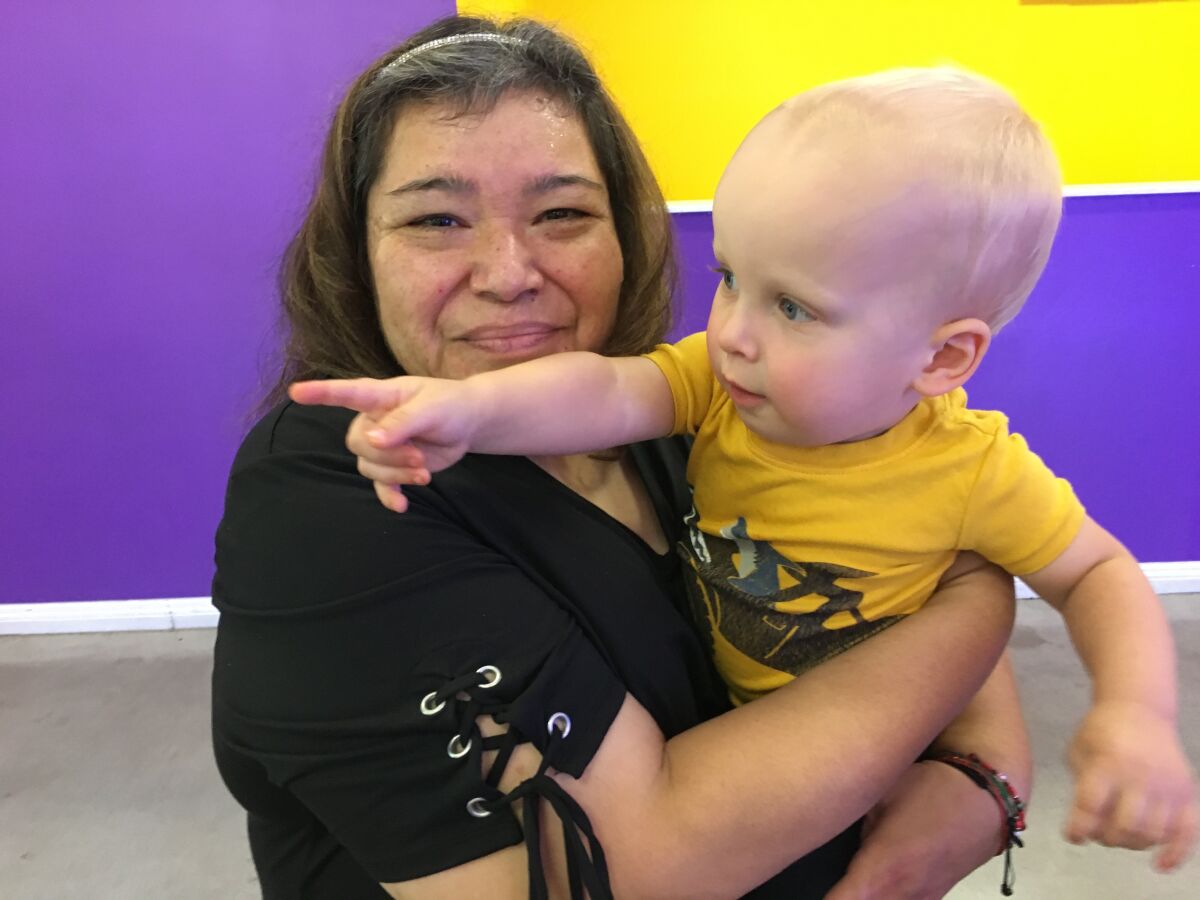 Lisa Agredano with the reporter's son, Charlie, in November 2019.