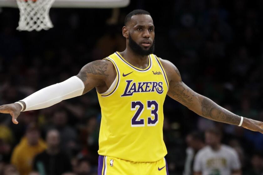 Los Angeles Lakers forward LeBron James (23) gestures in the fourth quarter of an NBA basketball game against the Boston Celtics, Thursday, Feb. 7, 2019, in Boston. The Lakers won 129-128. (AP Photo/Elise Amendola)