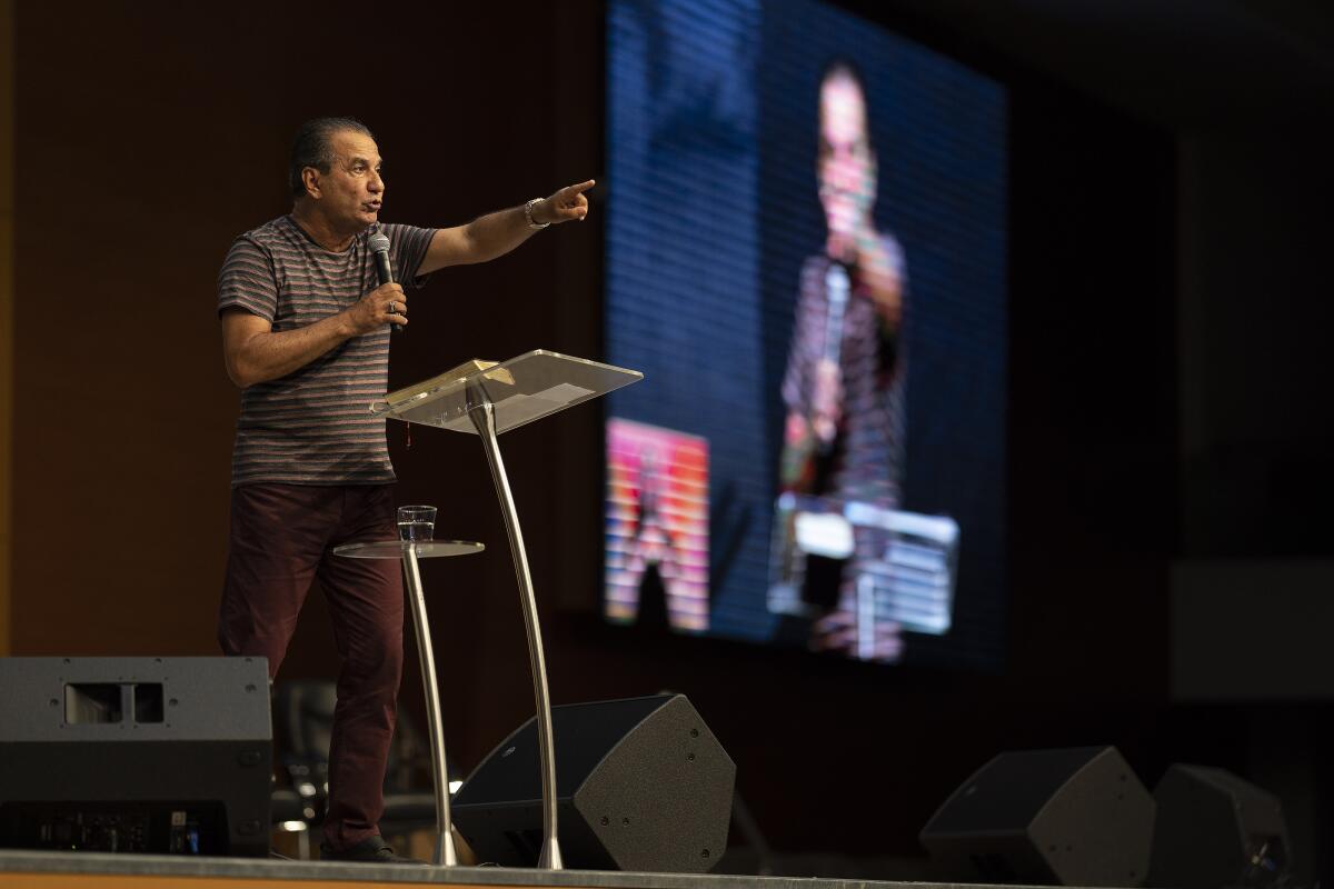 Pastor Silas Malafaia delivers a sermon during a live-streamed service at an empty church in Rio de Janeiro. Brazilian President Jair Bolsonaro  insists on the need to reopen churches.