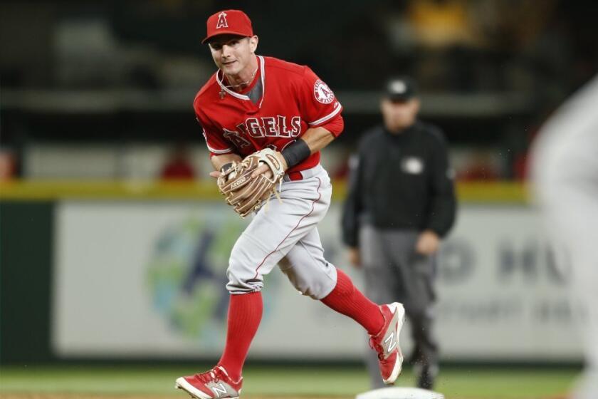 Angels second baseman Johnny Giavotella fields a ball during a game against the Seattle Mariners on July 10.