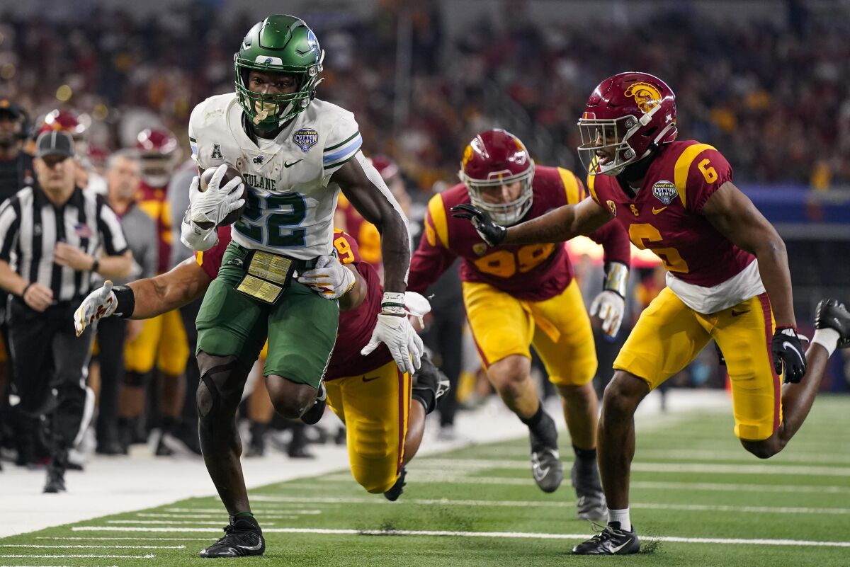 Tulane running back Tyjae Spears carries the ball in the first half against USC.