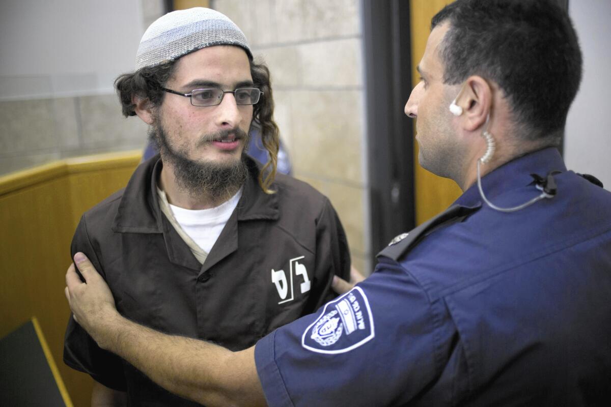 Meir Ettinger appears in court in Nazareth on Aug. 4, 2015. Ettinger, suspected of leading a Jewish extremist group, was arrested after the arson attack that killed a Palestinian toddler.