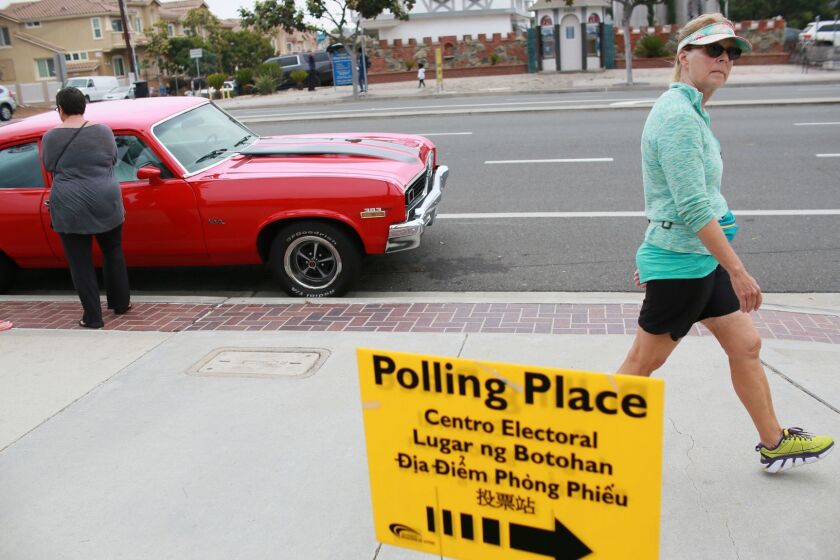 CARLSBAD, CA - JUNE 5: A polling station sign points the way along Hwy 101 on primary election day June 5, 2018 in Carlsbad, California. There are several highly competitive races throughout the state, including those for governor and U.S. House and Senate seats. (Photo by Sandy Huffaker/Getty Images) ** OUTS - ELSENT, FPG, CM - OUTS * NM, PH, VA if sourced by CT, LA or MoD **