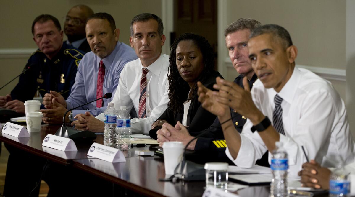 Los Angeles Mayor Eric Garcetti, center, attends meeting with President Obama on Wednesday.