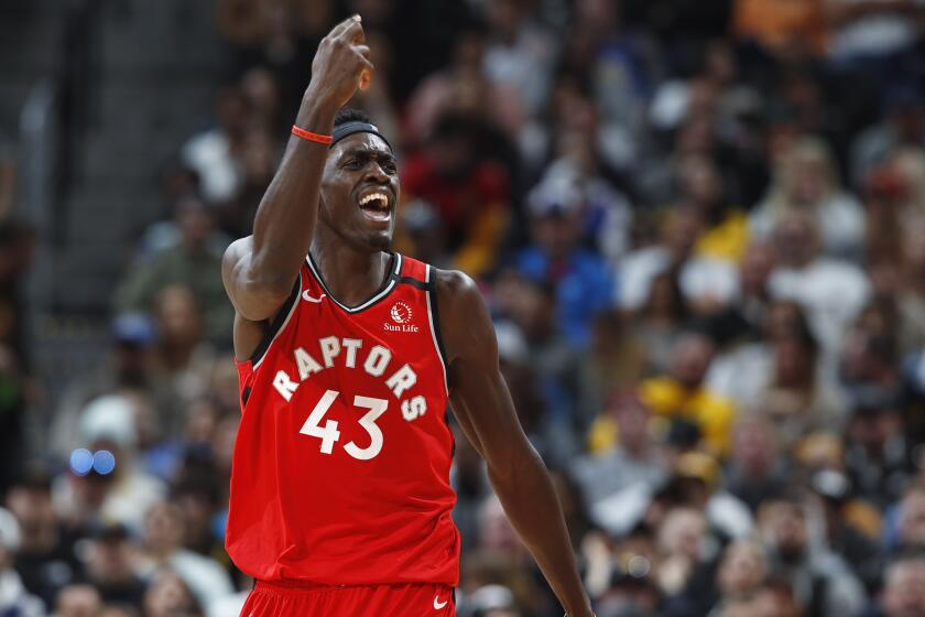 Toronto Raptors forward Pascal Siakam argues for a review of a foul called on him in the second half of an NBA basketball game against the Denver Nuggets Sunday, March 1, 2020. The Nuggets won 133-118. (AP Photo/David Zalubowski)