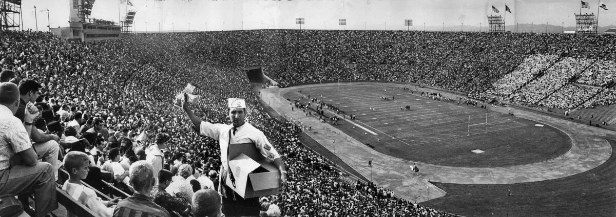 Nov. 24, 1962: A crowd of 86,740 attends the UCLA-USC football game at the Los Angeles Memorial Coliseum. USC won 14-3.