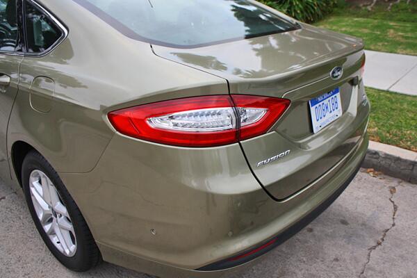 If you're an avid cyclist and are considering the 2013 Ford Fusion as your next car, it looks like you'll want to invest in a roof-mounted bike rack. The design of the Fusion's rear end presents two issues that make hanging your bike off the back a bad idea.