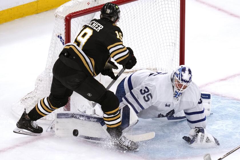 Toronto Maple Leafs goaltender Ilya Samsonov (35) makes a save against a shot by Boston Bruins center John Beecher (19) during the second period of Game 2 of an NHL hockey Stanley Cup first-round playoff series, Monday, April 22, 2024, in Boston. (AP Photo/Charles Krupa)