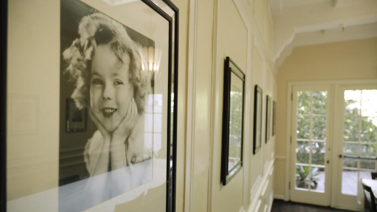 Portraits of the child star hang in the Shirley Temple dining room at the Fox Studios commissary. She was one of the early major stars for the studio.