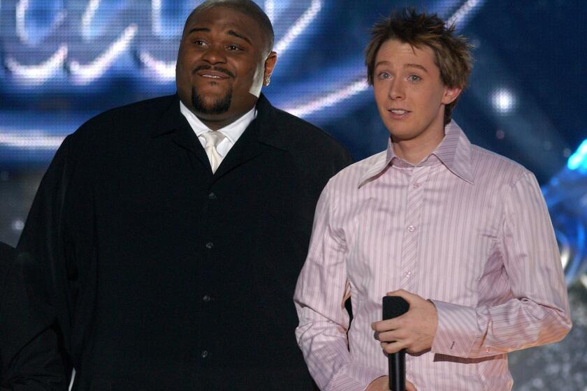 In a file photo from 2003, Clay Aiken, right, with eventual "American Idol" winner Ruben Studdard.