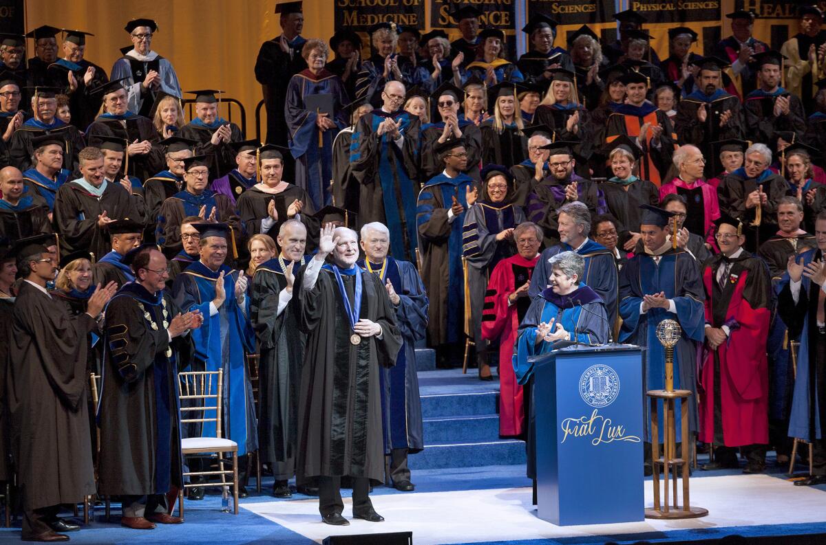 Newly appointed UC Irvine Chancellor Howard Gillman acknowledges his supporters during an investiture ceremony at the Irvine Barclay Theatre on March 31. Reports of a man with a gun on the campus during the investiture locked down the ceremony.