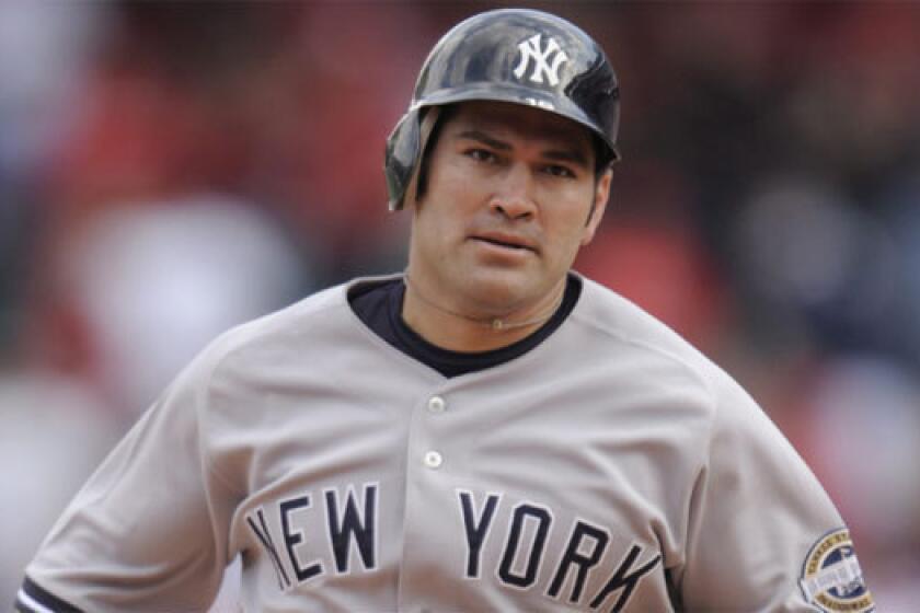 Johnny Damon, shown with the New York Yankees in 2009, says he has repeatedly offered to return to his former team.