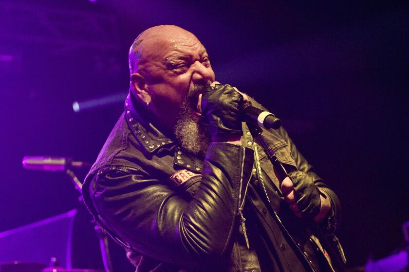 English heavy metal musician Paul Di'Anno performing live on stage at the 2013 Hard Rock Hell festival in Pwllheli, Wales.