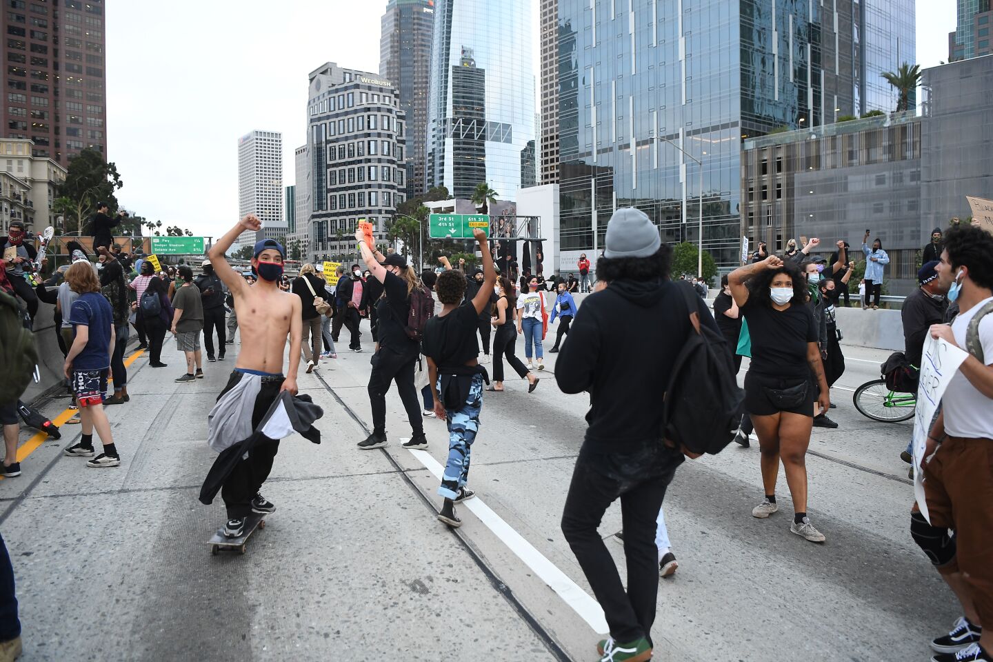Protesters block the 110 Freeway.