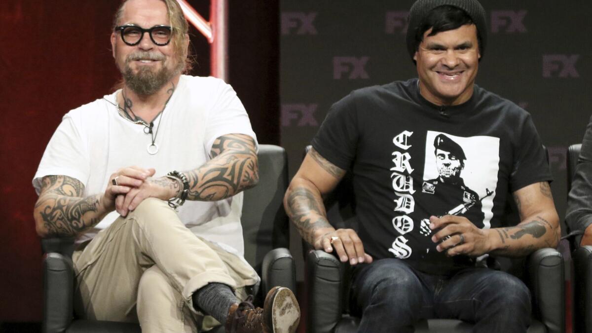 Kurt Sutter, co-creator/executive producer/writer, left, and Elgin James, co-creator/executive producer/writer/director, participate in the "Mayans M.C." panel during the FX Television Critics Association Summer Press Tour.